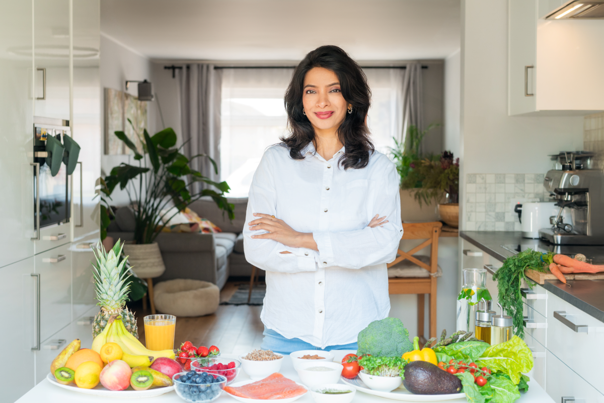 Certified nutrition professional preparing healthy food in a home setting